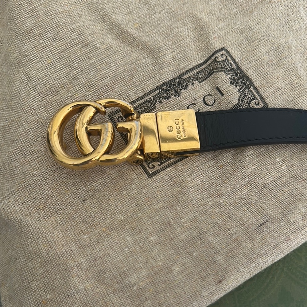 Gucci Marmont Reversible Black and White Belt with Gold GG Emblem
